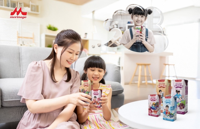 A person and a child sitting on a couchAI-generated content may be incorrect.